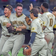 Padres’ pitcher Joe Musgrove is mobbed by teammates after authoring first no-hitter in S.D. history.